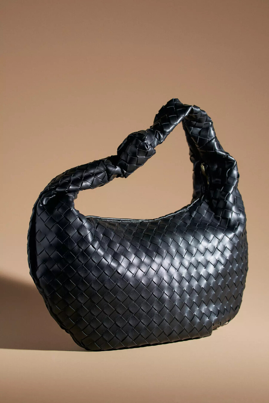 borsa a tracolla brigitte in similpelle intrecciata di melie bianco edizione oversize