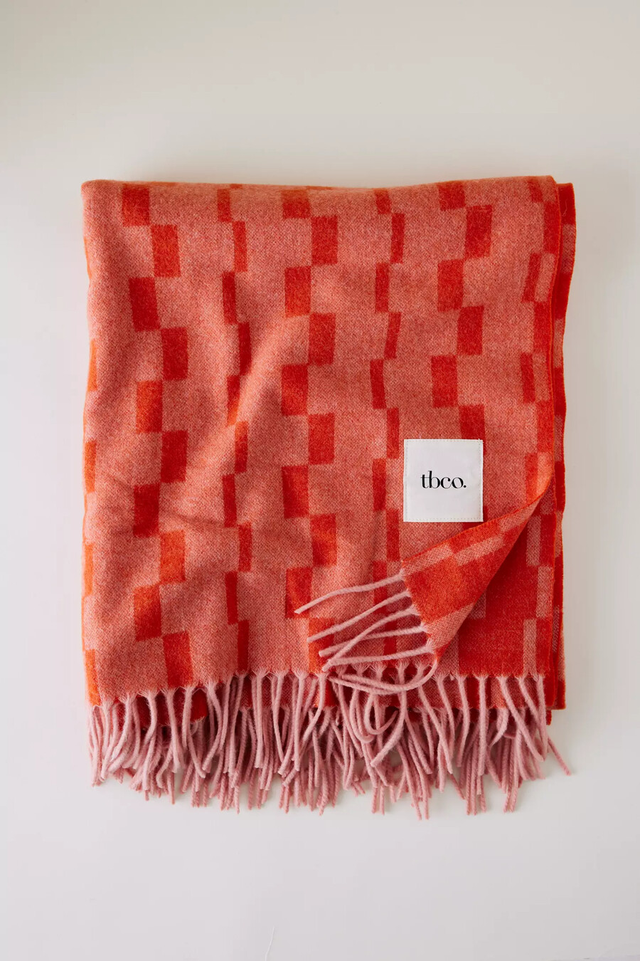 coperta in lana a quadri rosa tbco