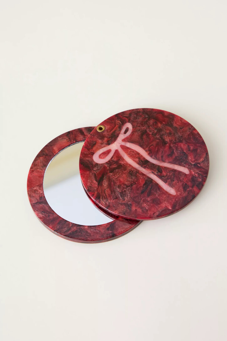 specchio compatto con fiocco rosso solar eclipse