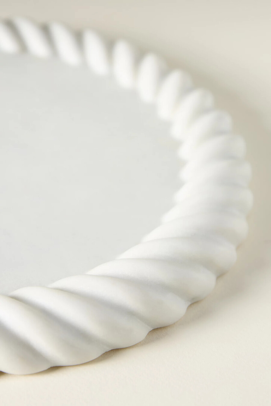 tagliere per formaggi in marmo intrecciato