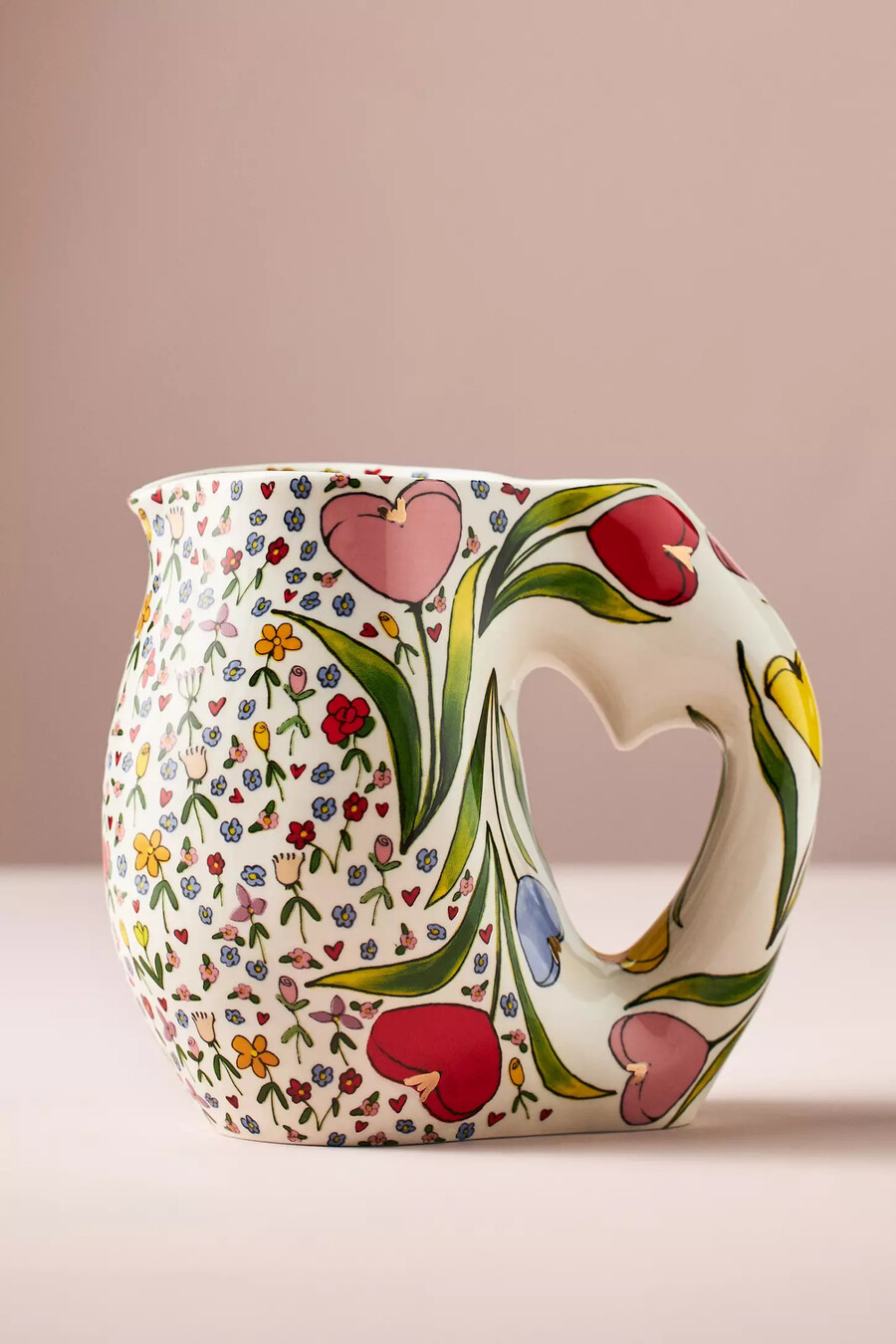 brocca in gres con cuori fioriti della fata del fango