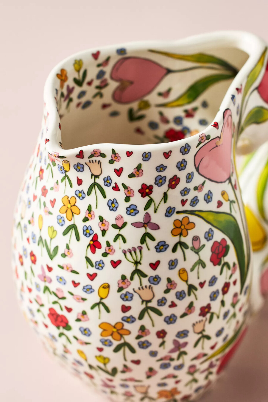 brocca in gres con cuori fioriti della fata del fango