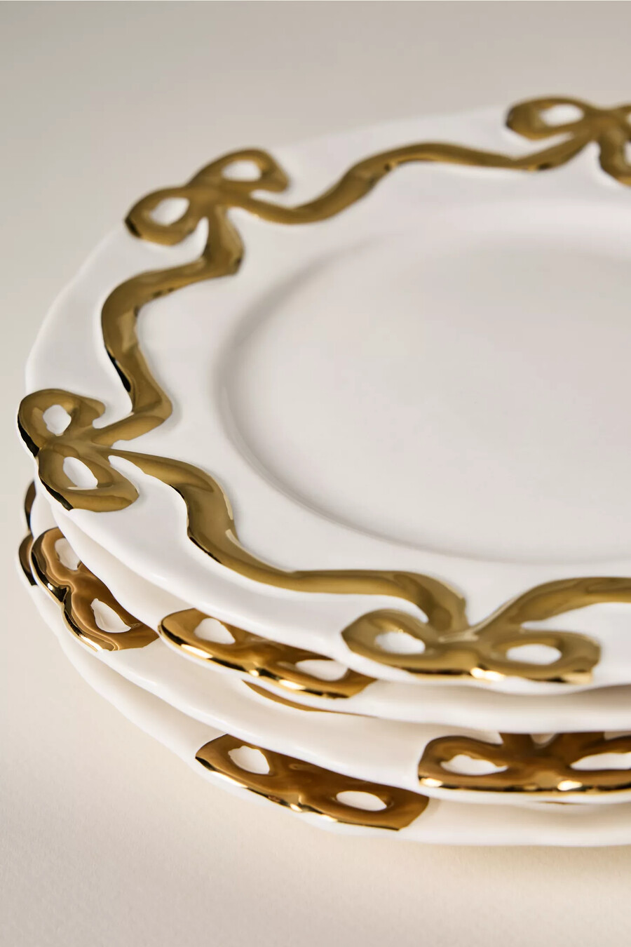 piatti da portata in gres benedita gold bow set da 4