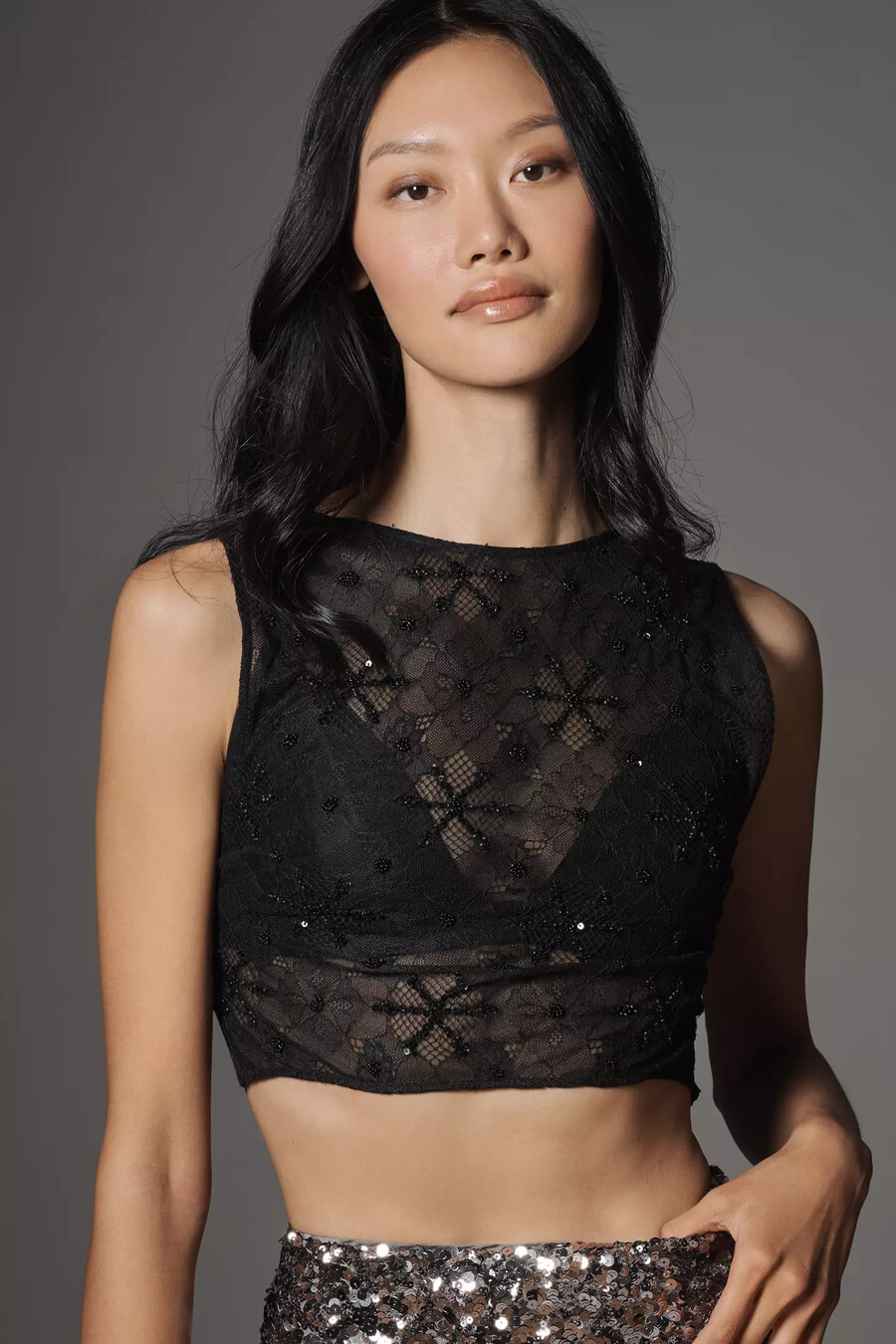 top trasparente con paillettes e collo alto lyrebird
