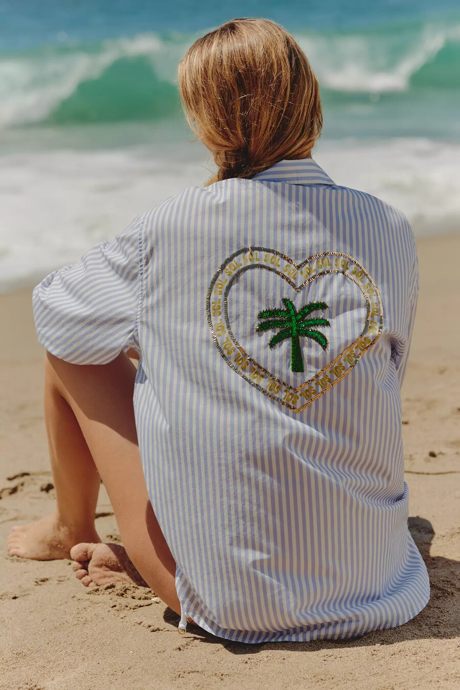 camicia oversize con bottoni e grafica celandine